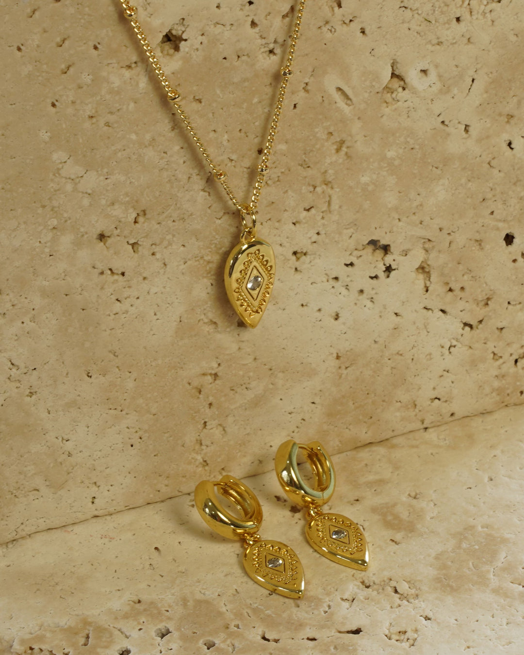Tear drop evil eye earrings